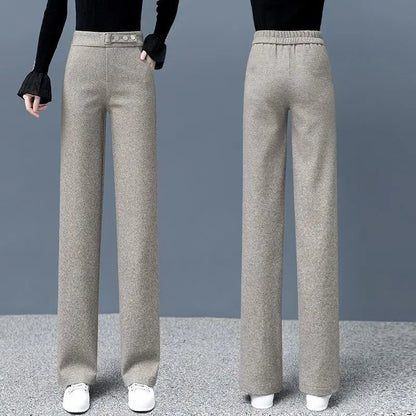 Elegant gray tailored Astoria Pants for women, featuring a high-waist and a subtle herringbone texture.