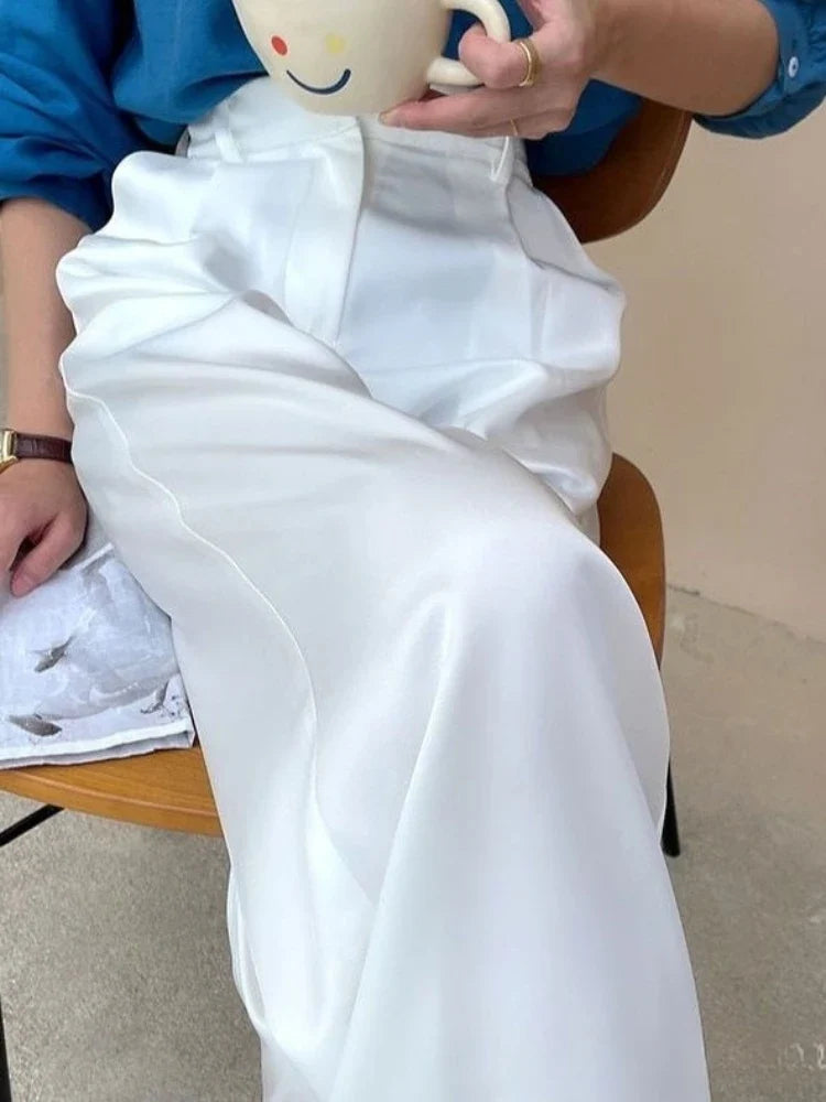 Stylish women's high waist wide leg flowy pants, comfortable and chic for everyday wear.