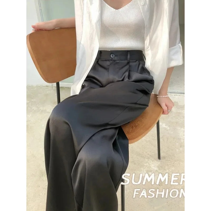 Loose fit, high waist flowy pants for women, offering ultimate comfort & style.