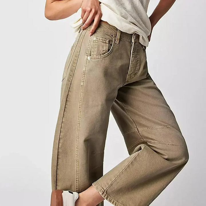Stylish white high waist wide leg jeans for women. Effortlessly comfortable relaxed fit, perfect for casual modern looks.