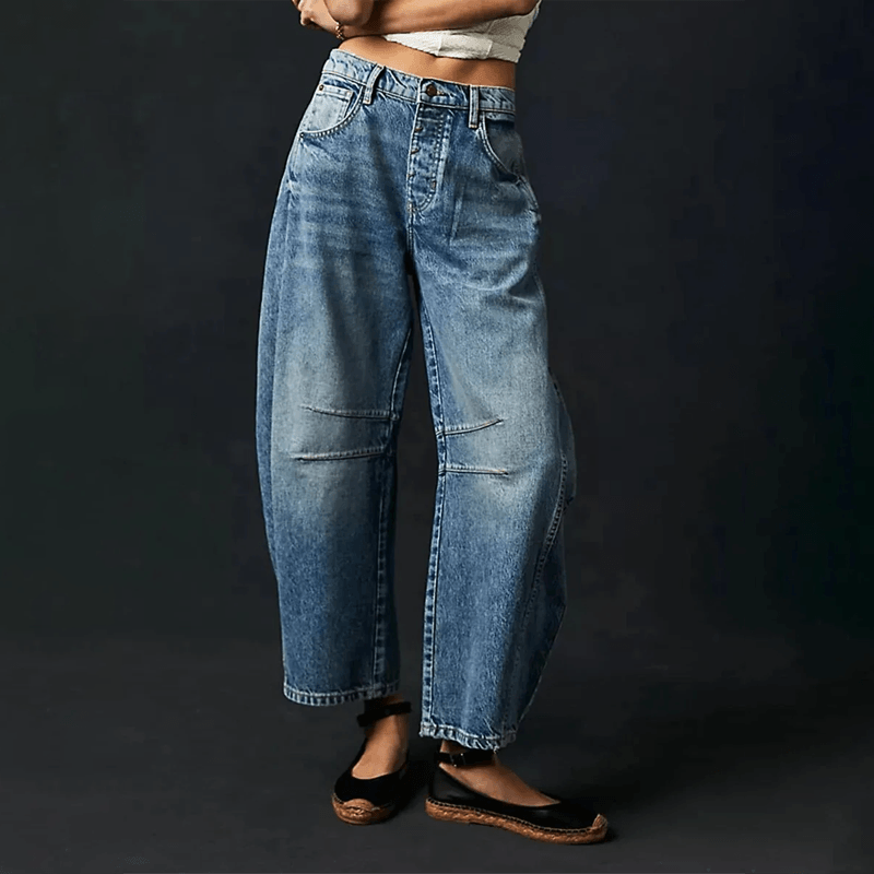 Beige high waist wide leg jeans for women. Comfortable relaxed fit, a modern and casual fashion statement.