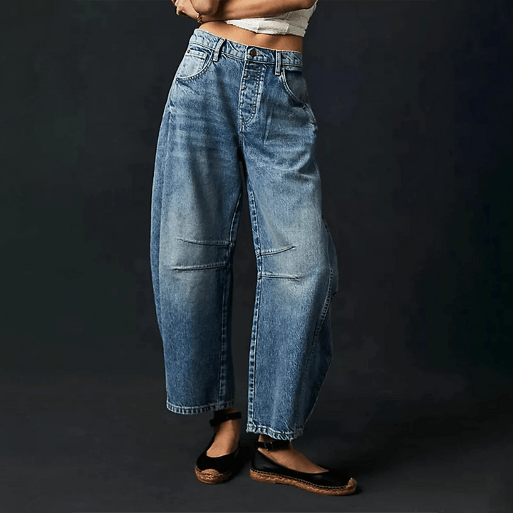 Beige high waist wide leg jeans for women. Comfortable relaxed fit, a modern and casual fashion statement.