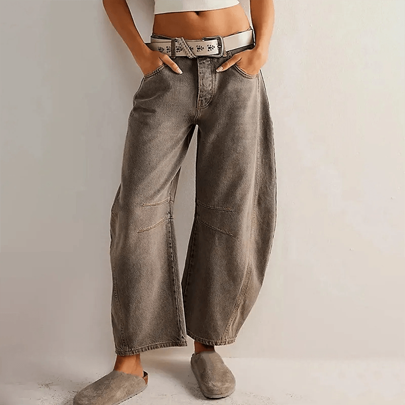 Women's comfortable high waist wide leg jeans. Relaxed fit design for modern casual everyday fashion bottoms.