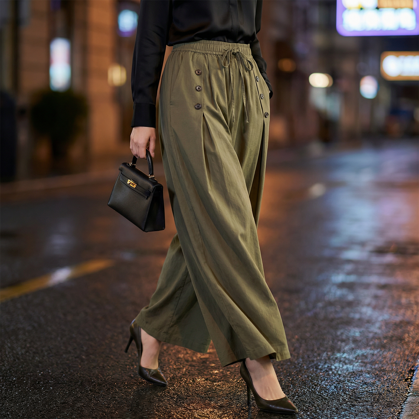 Stylish women's flowy wide-leg pants, high-waist design, offering a comfortable, relaxed fit perfect for casual fashion.