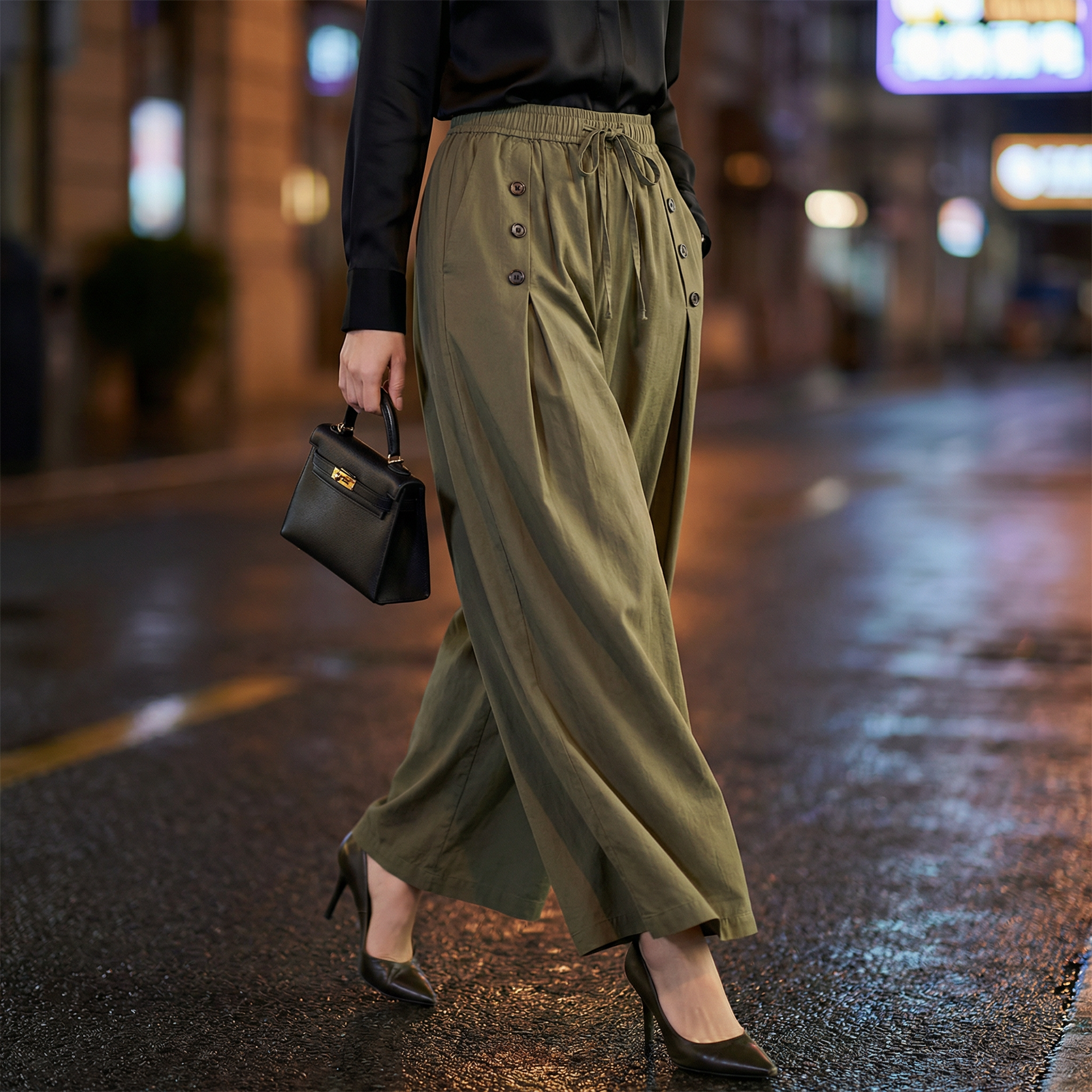 Stylish women's flowy wide-leg pants, high-waist design, offering a comfortable, relaxed fit perfect for casual fashion.