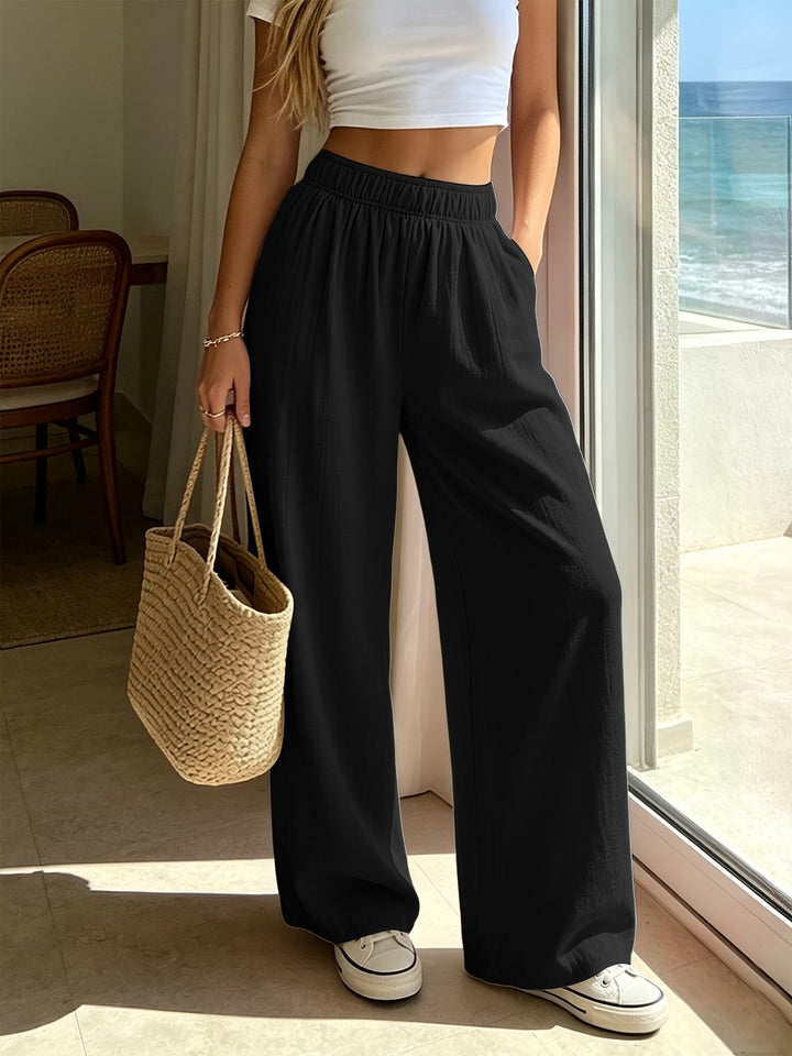 Chic women's wide leg drawstring pants. Perfect high waist casual style for summer vacation or beachwear.