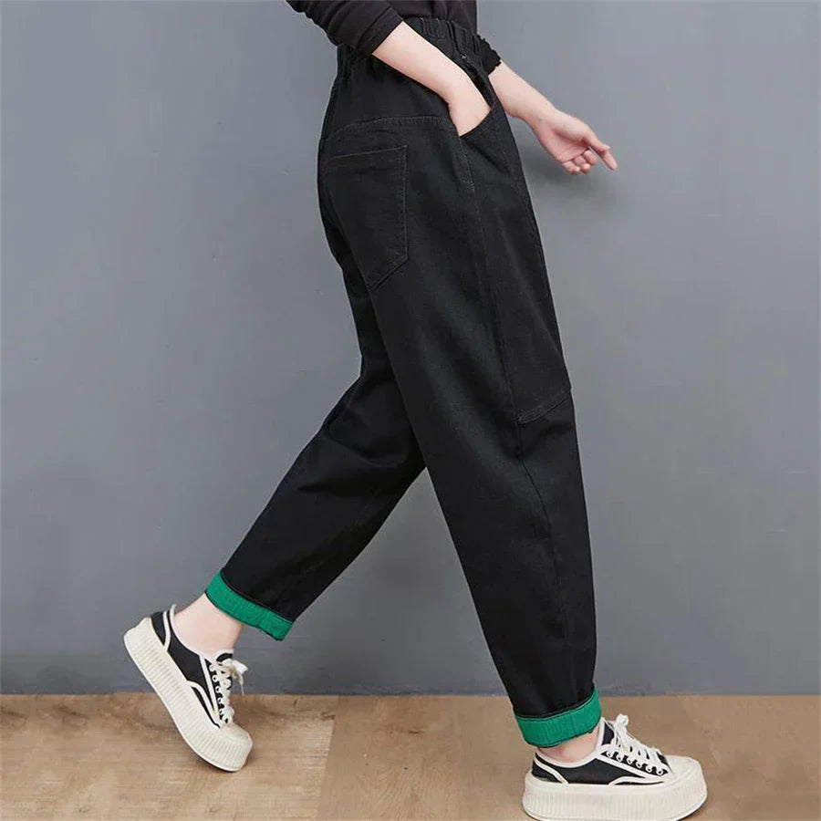 Stylish women's oversized ankle jeans; a perfect blend of high-waisted, baggy fit, & vintage aesthetic.