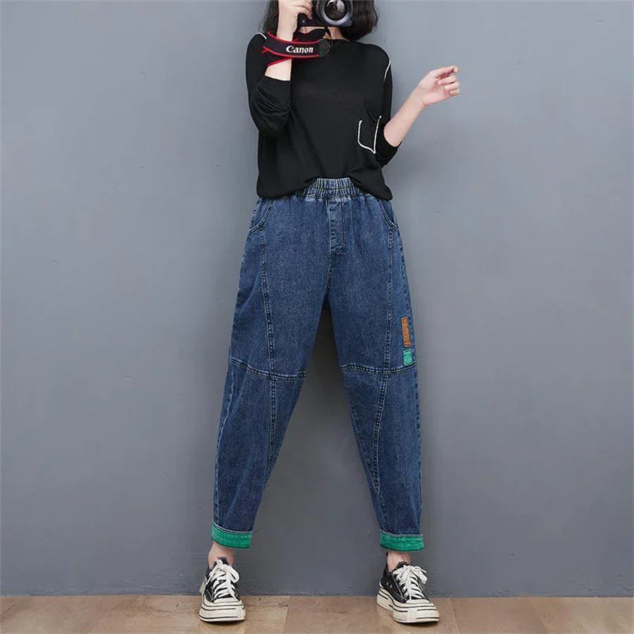 Fall fashion essential: Women's high-waisted baggy oversized ankle jeans in a versatile denim wash.