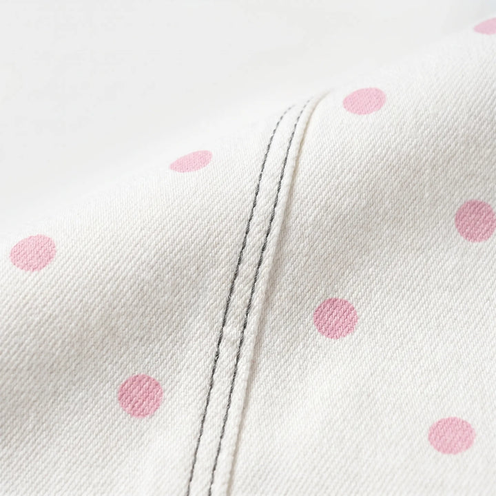 Relaxed fit women's high-waisted barrel trousers featuring a stylish polka dot print. Perfect for casual wear.