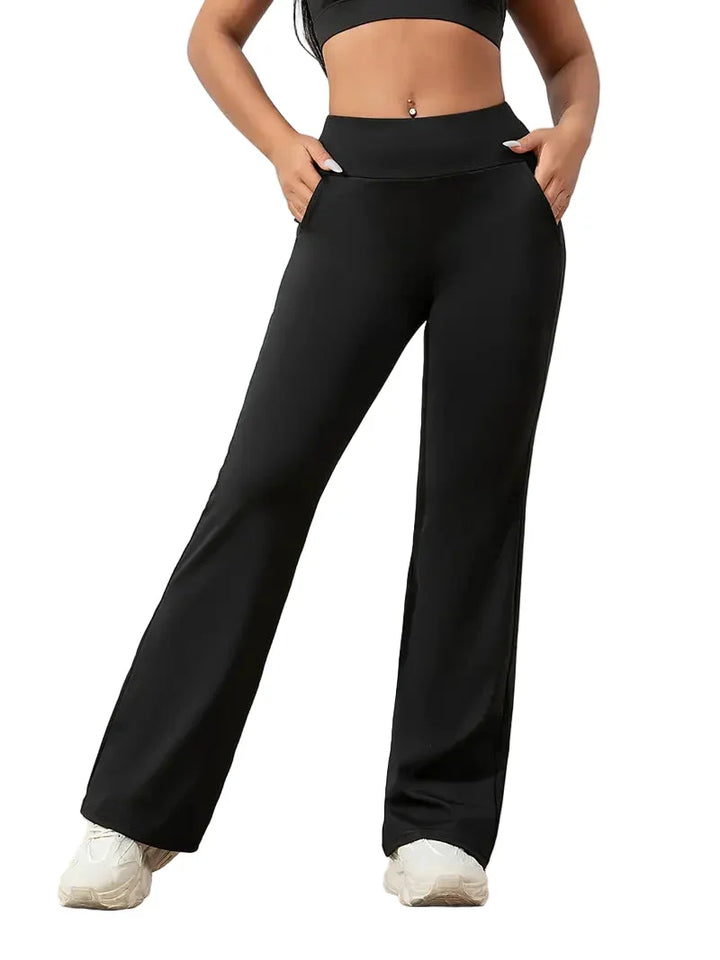 Women's high-waisted flared active pants, perfect for yoga, workouts & casual wear. Comfortable athleisure style.