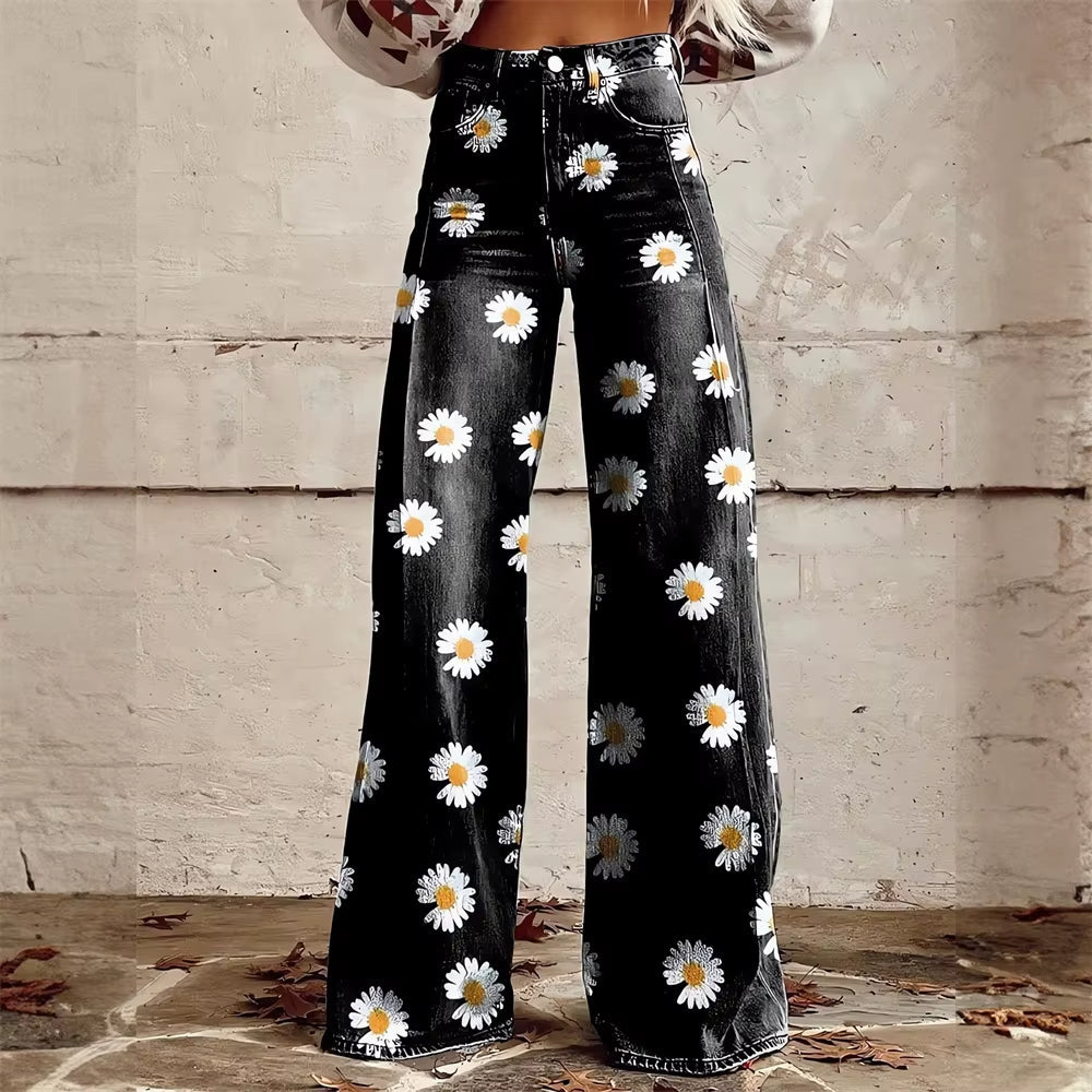 Fashionable women's high-waisted flared jeans featuring a vibrant celestial pattern. Comfortable, wide-leg denim.