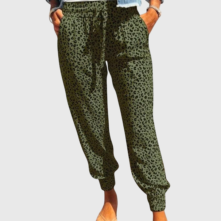 Women's high-waisted leopard print wide-leg pants. Flowy, comfortable fashion pants for casual or dressy wear.