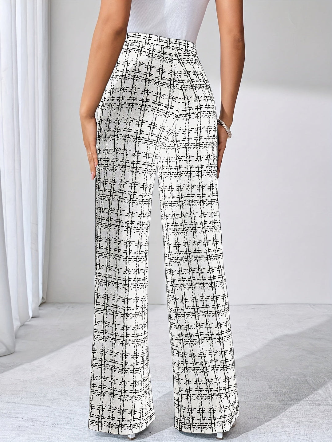 Stylish high-waisted women's plaid flare pants, wrinkle-resistant stretch knit for easy care.