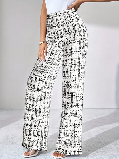 Pull-on women's high-waisted plaid flare pants in a soft, comfortable stretch knit design.