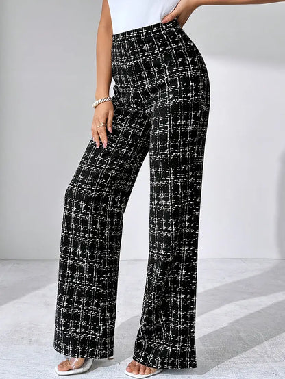 Women's high-waisted plaid flare pants, stretch knit material for a flattering fit and flexibility.