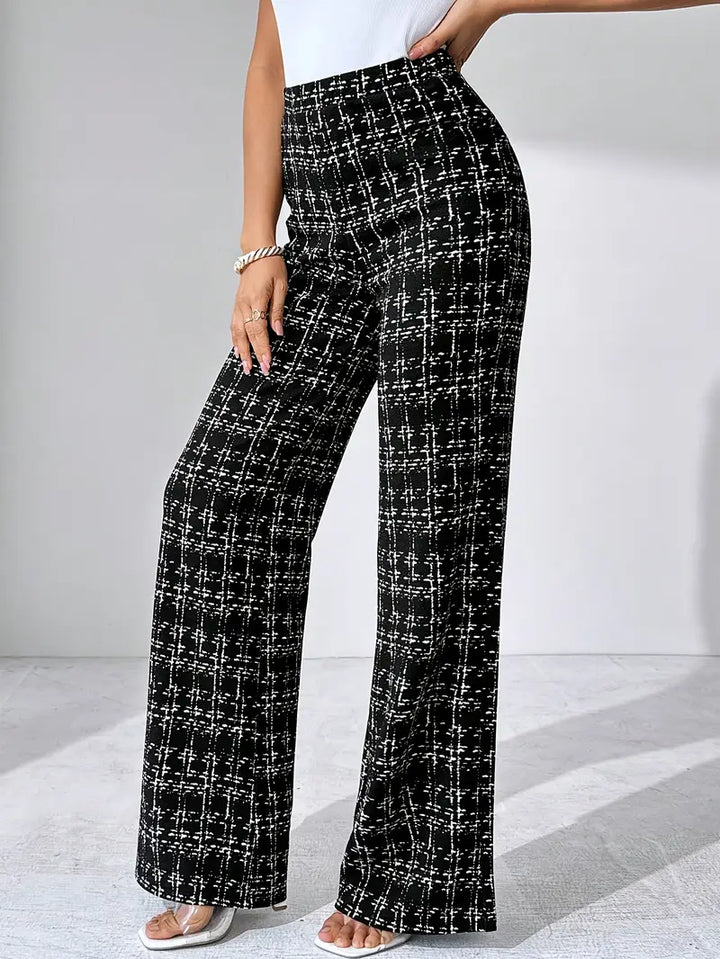 Women's high-waisted plaid flare pants, stretch knit material for a flattering fit and flexibility.