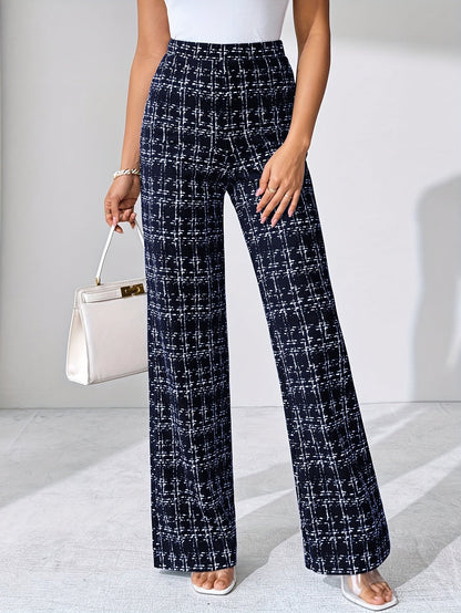 Modern women's high-waisted plaid flare pants made from comfortable stretch knit fabric.