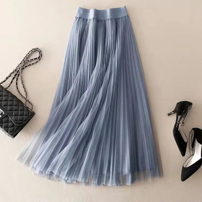 Stylish women's high-waisted pleated midi skirt, A-line design for sophisticated office or event wear.