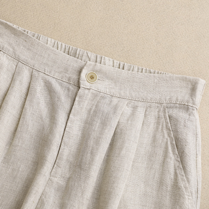 Women's high-waisted pleated summer shorts styled for a comfy, casual look. Perfect everyday warm weather fashion.