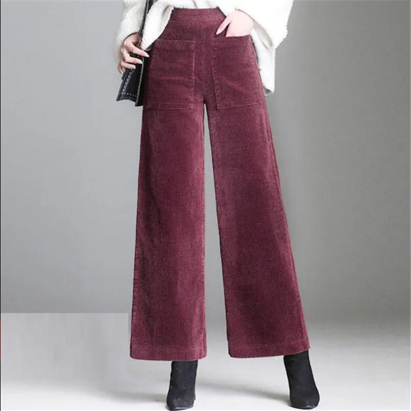 Casual chic women's high-waisted flare trousers, vintage-inspired for versatile everyday & elegant wear.