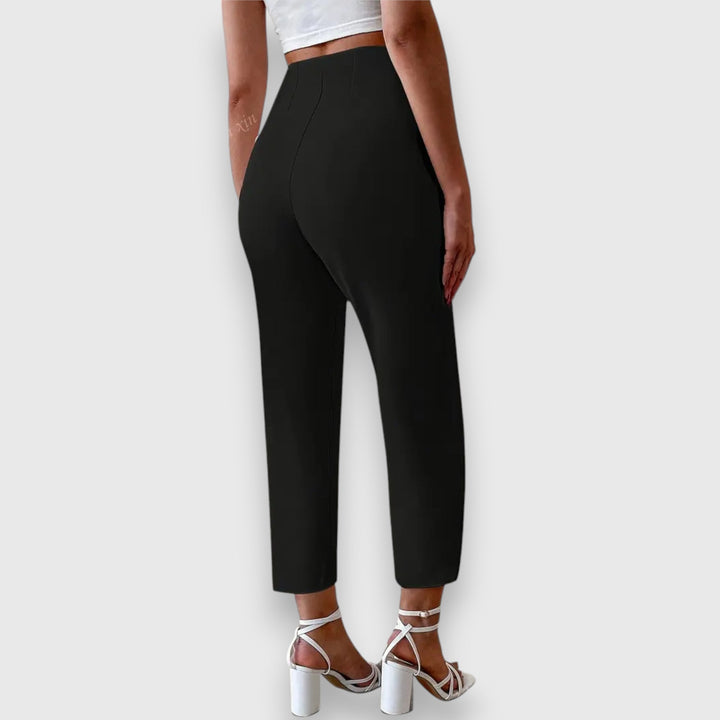 Close-up of elegant women's straight leg dress pants, highlighting the high waist design and tailored fit.