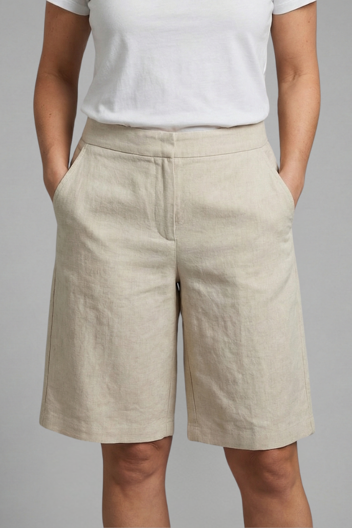 Women's high-waisted tailored shorts for summer. Chic & comfortable relaxed fit perfect for warm weather fashion.