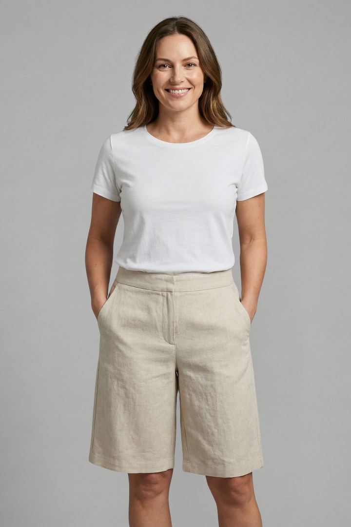 Elegant high-waisted tailored women's shorts, designed for a comfortable, relaxed fit and chic summer style.