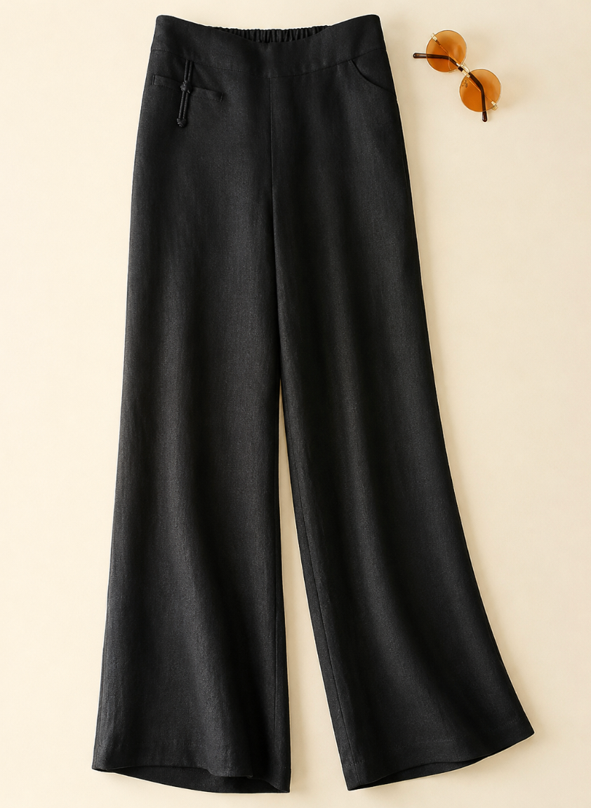 Relaxed fit women's high-waist wide-leg pants. Effortless casual style, perfect for spring/summer versatility.