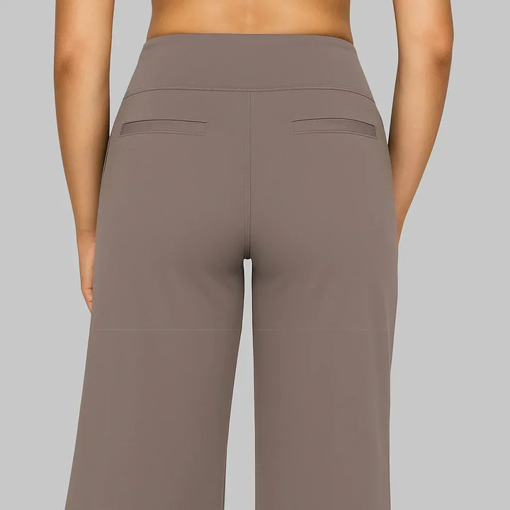 Flowy women's wide-leg pants, high-waisted for a flattering silhouette and casual spring fashion.