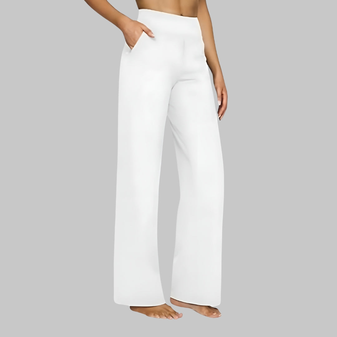 Close-up of side pockets on women's high-waisted wide-leg pants, highlighting practical design.