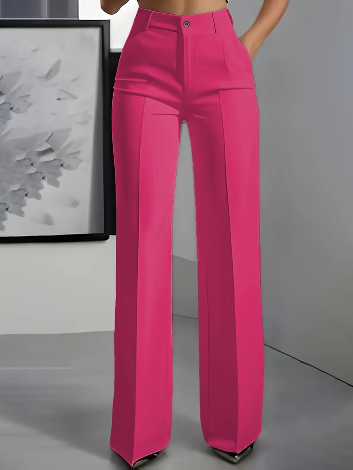 Professional women's high-waist wide-leg trousers, structured and elegant for a sophisticated office look.