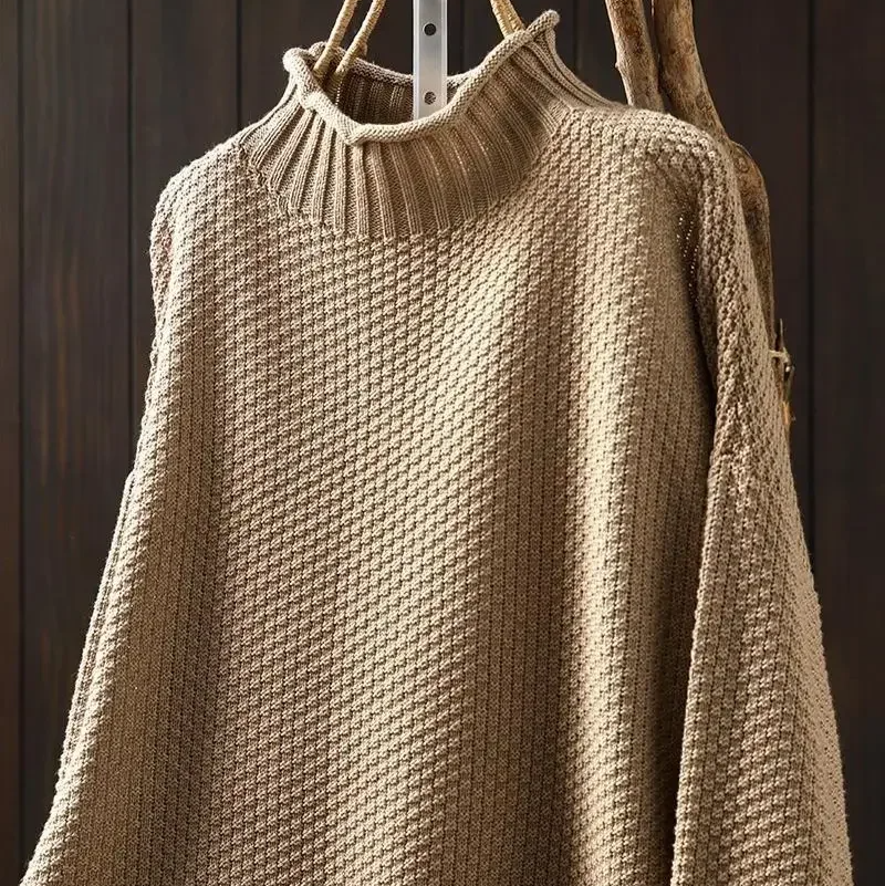 Stylish women's honeycomb knit sweater, an essential long sleeve piece for fall & winter fashion.