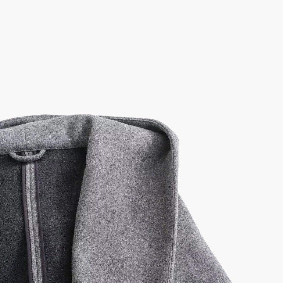 Versatile women's outerwear hooded trench coat, perfect for fall fashion and spring showers.