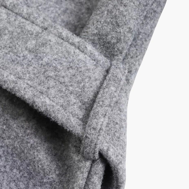 Casual belted hooded trench coat for women, ideal for outdoor protection and stylish wear.