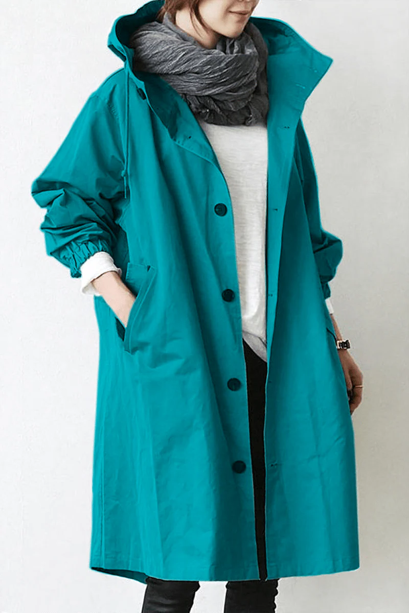 Women's hooded waterproof trench coat in classic beige, perfect for elegant all-weather style and rain protection.
