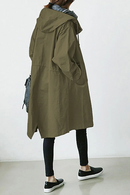 Fashionable women's long hooded trench coat, waterproof and chic for sophisticated outerwear in any weather.