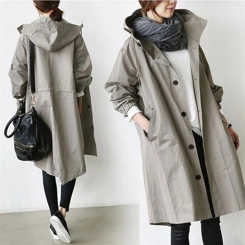 Modern women's hooded waterproof trench coat, designed for sophisticated daily wear and effective rain protection.
