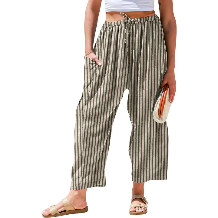 Boho-chic women's striped wide-leg pants. Effortlessly stylish and comfortable, perfect for vacation or resort wear.