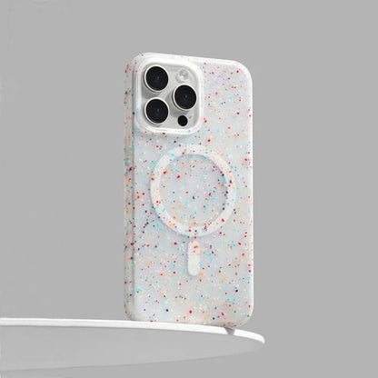 Women's InkSplash iPhone case with MagSafe, featuring a vibrant paint splatter design for artistic protection.