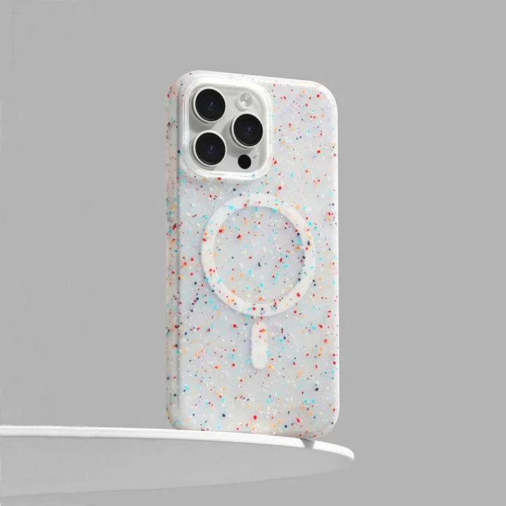 Women's InkSplash iPhone case with MagSafe, featuring a vibrant paint splatter design for artistic protection.