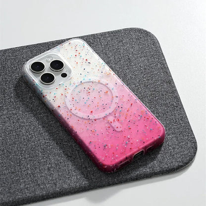 Slim women's iPhone MagSafe case, InkSplash design with vibrant paint splatter, offering full protection.