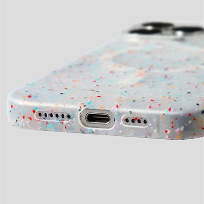 Vibrant InkSplash iPhone case for women, MagSafe compatible phone cover with unique paint splatter art.