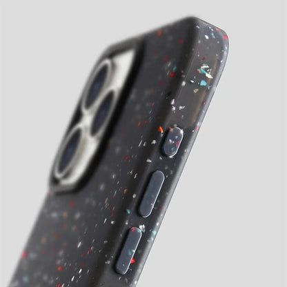 Durable women's InkSplash iPhone case, shockproof silicone phone cover with MagSafe and artistic paint.