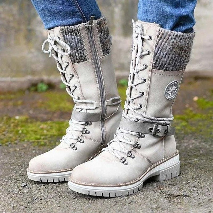 Women's insulated winter boots with non-slip sole, offering warmth & safety.