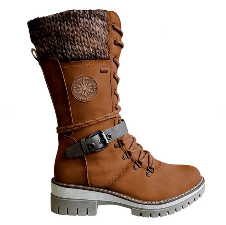 Waterproof women's snow boots, insulated for superior warmth, offering reliable grip.