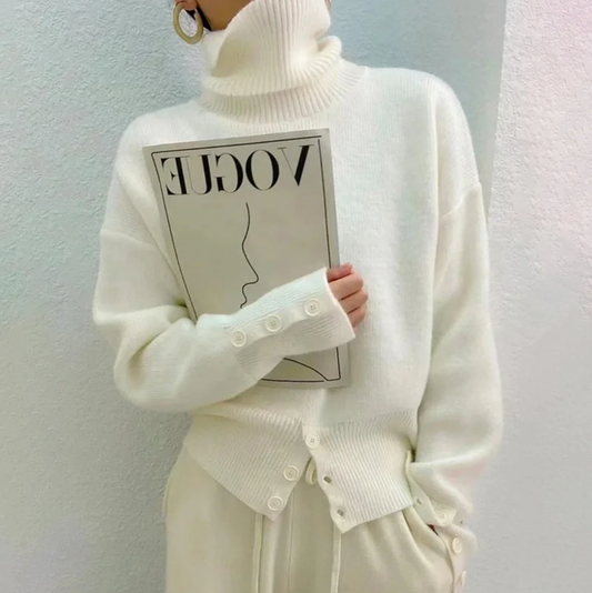 Women's ivory plain knit turtleneck sweater, a cozy long-sleeve top for elegant fall and winter fashion.