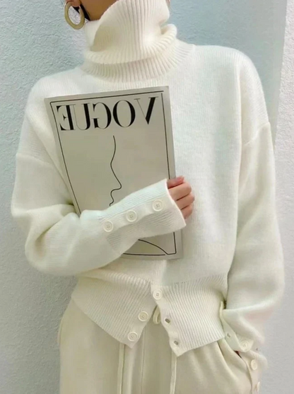 Chic women's ivory knit turtleneck sweater. Comfortable long-sleeve knitwear, perfect for versatile winter style.