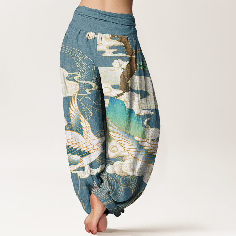 Comfortable women's bohemian harem trousers with a vibrant Japanese crane art design. Relaxed fit fashion.
