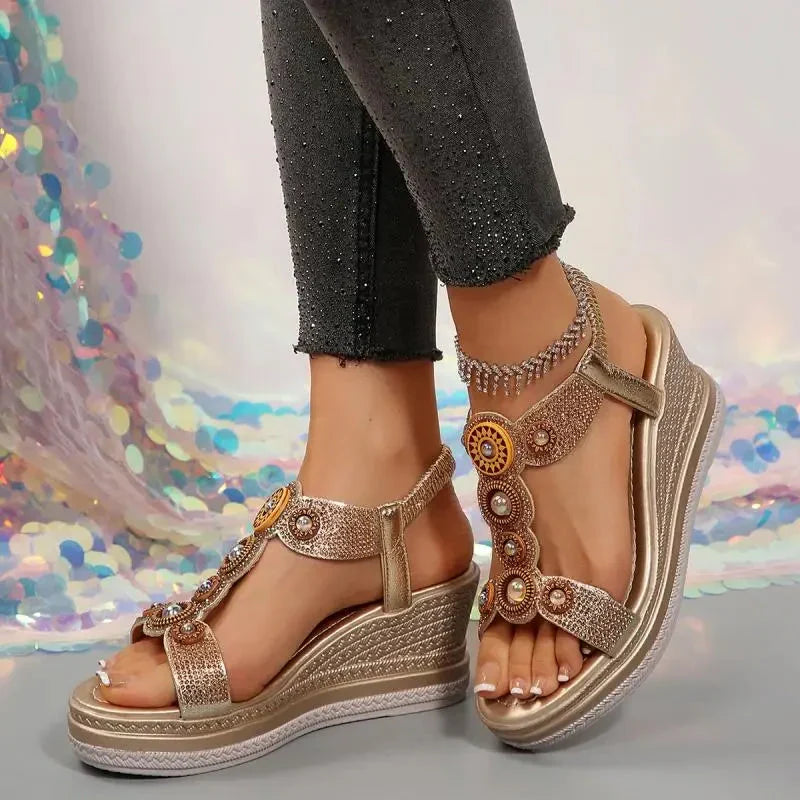 Fashionable women's jeweled wedge sandals. Comfortable platform design with a secure ankle strap for elegant summer wear.