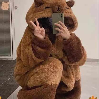 Cute women's hooded capybara pajama set for cozy sleepwear. Soft loungewear, two-piece comfy nightgown.
